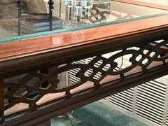 Very nice square end table with glass inlay and open die cut apron…..27” square x 22” tall