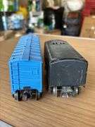 (2) Lionel Train Cars….Lionel Lines 3357 (missing an axle) and Lionel 1689T Tender