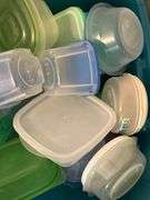Tote full of plastic storage bowls