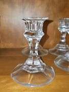 Four candle sticks and epergne base.
