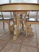 Pier 1 imports table and four chairs. Includes 18 inch leaf. Table is 47.5 x 30.5 in tall. Chairs are 18x 17.5x 39 in tall. Seat height is 18 in.