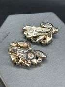 Gorgeous 3-piece vintage Weiss clip-ons and brooch with sparkling iridescent blue stones