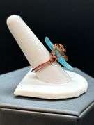 Uniquely designed copper wire ring with blue & brown stone…..size 10