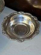 Very nice selection of silverplate items……compote, 2 small bowls, medium-sized bowl, rose bowl(?), and round serving tray
