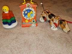 Vintage Fisher-Price toys. Snoopy and teaching clock in working order. Sparkling symphony star sticker needs batteries.