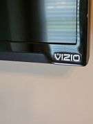 Vizio 38-in flat screen TV with remote. Does not include mount. Turns on, no cable connection.