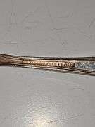 Old company plate flatware possibly Signature Rose pattern. 12 dinner forks, 10 dinner knives six soup spoons 9 teaspoons monogrammed H. Circa 1940s