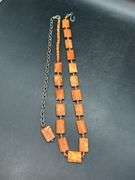 Adjustable waist size rust colored beaded ladies belt
