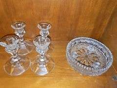 Four candle sticks and epergne base.