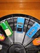 Vintage Hot wheel carrying case and cars as shown. Four redline wheels in this grouping.