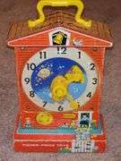 Vintage Fisher-Price toys. Snoopy and teaching clock in working order. Sparkling symphony star sticker needs batteries.