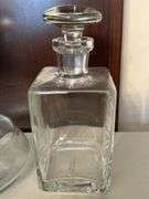 (2) very nice looking clear glass decanters…..left is unmarked (10–/4 tall) and right is Pottery Barn (9” tall)