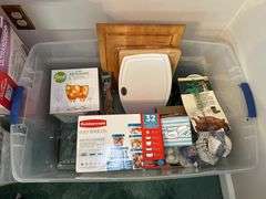 Tote full of miscellaneous household/kitchen items…..Food Network stemware, partial box of Rubbermaid storage containers, cutting boards and more