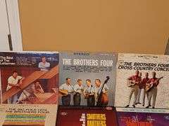 Grouping of albums by The lettermen The Brothers Four, Smothers Brothers, the Kingston Trio, and Charlie Byrd.