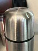 Selection of insulated drink containers and (1) glass sports bottle…..all are NEW and far right silver piece has a dent in the top and comes with carry case (see all pics as more were added) cups are by Primula