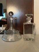 (2) very nice looking clear glass decanters…..left is unmarked (10–/4 tall) and right is Pottery Barn (9” tall)