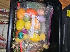 Two containers of decorative Easter items.