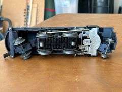 Selection of (2) Lionel Train pieces…..242 Steam Engine (with damage) and Lehigh Valley (L.V. 25000) red rail car