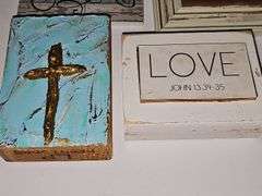 Christian artwork, crosses, Angels, friends, and a flower painting on a board