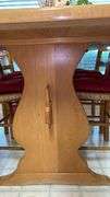 Exquisite custom built table and chairs……custom built in 1972 in Nicosia, Cyprus from oak(?). There are no nails except on the chairs to hold the rush seating in place. Chairs are hand carved…..one small blemish on table top