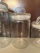Selection of (3) Kirkland’s glass canisters with rubber seal around lids…..sizes range from 7-1/2 to 11-1/2” tall