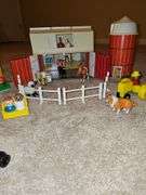 Fisher Price Little people playsets as shown. See all photos. Some pieces have some melting from attic storage as seen on elephant in last photo.