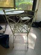 Vintage wrought iron slate top patio table with 2 wrought iron folding chairs with basketweave design seating……36”D x 30” tall…..15-1/2 x 15 x 17-1/2 to seat (36-1/4 tall overall)…..set is heavy