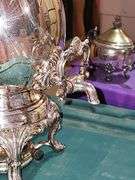 Tub of silver plate items. Two teapots, heated coffee pot, covered sugar, and creamer.