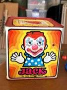Table full of vintage toys…..Tuggy Tooter does still work, wooden puzzles, Jack-In-The-Box turns but no music nor does he pop out, wooden blocks and more