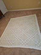 Hand stitched vintage quilt. 67x74 in.
