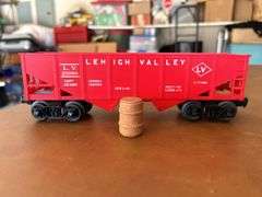 Selection of (2) Lionel Train pieces…..242 Steam Engine (with damage) and Lehigh Valley (L.V. 25000) red rail car