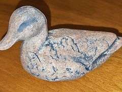 Three collectable ducks.