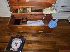 Contents of Lane cedar chest. Cedar chest is not included.