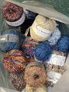 Very nice selection of yarn…..lots of color, lots of sparkle, lots of everything…..4 brand new bamboo knitting needles (please see all pics…..too much to try to capture all in one shot)