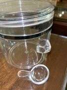 Set of (4) OGGI acrylic canisters…..only 1 has spoon….heights range from 4” to 9” tall…..another was found after initial listing