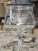 Cabinet of stemware. Matching set of 11 iced beverages, 11 wine glasses, 12 coupe champagne glasses. Matching set of 8 "H" monogrammed glasses, four shrimp cocktail stems with liners and more. See all photos.