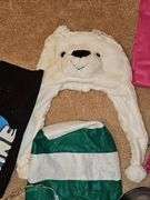 Miscellaneous grouping. Super Grover t-shirt,pink apron, Mardi gras style masks, beads, polar bear hat, and more.