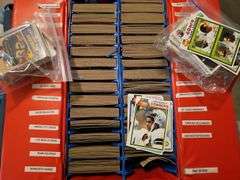 A grouping of football cards from the 1970s, sorted by teams.  See additional information and all photos.