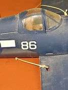 Model of a Vought F4U Corsair American fighter aircraft. (Missing right front wheel) Stuka-Junkers Ju 87, German dive bomber plane.