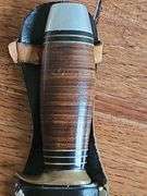 Guttman Cutlery Company (G.C. CO. ITALY) Bowie Knife. Blade is stamped "G.C.Co. Italy" and "Bowie" on the front and "377" on the reverse.