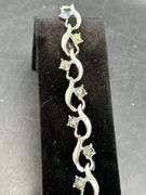 Beautiful vintage silver tone bracelet with sparkling iridescent stones…..7” long…..matching choker is lot 99
