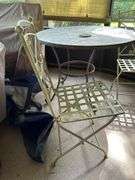 Vintage wrought iron slate top patio table with 2 wrought iron folding chairs with basketweave design seating……36”D x 30” tall…..15-1/2 x 15 x 17-1/2 to seat (36-1/4 tall overall)…..set is heavy