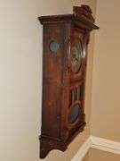 Antique pendulum clock. Chimes on half hour and counts whole hours. Did not locate a maker. Was operating properly at time of listing. 11x7.5 x 30 in tall.