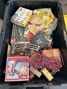 27 gallon tote full of Lionel train pieces and parts