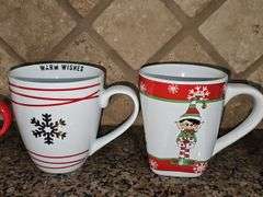 Nice grouping of cocoa mugs.