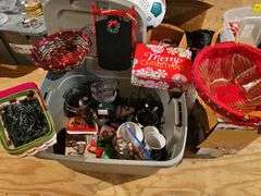 Tub of decorative Christmas items.