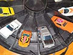 Vintage Hot wheel carrying case and cars as shown. One redline wheel in this grouping. Dukes of Hazzard car is Ertl.