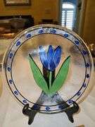 Pair of Kosta Boda Glass Tulipa 7.5” Plates Blue Tulip Hand Painted Signed Ulrica Vallien in like new condition no chips, cracks, or other blemishes...