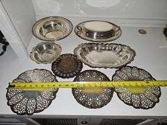 Silver plate bowls, covered dish, and trivets.