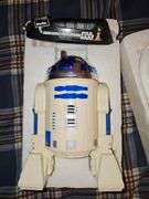 R2-D2 radio controlled robot With remote. Needs three 9 volt batteries. Untested
